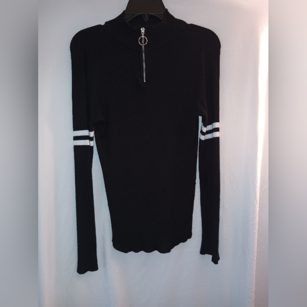 Woman's black and white sweater